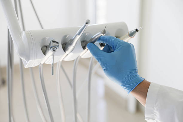 Professional Tooth Extraction technician working in South Elgin, IL